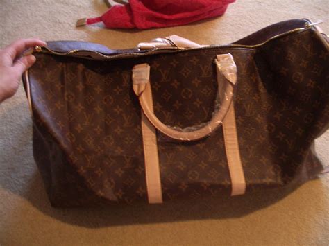 louis vuitton mens duffle bag fake